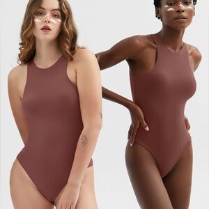 Pumiey High Neck Sleeveless Bodysuit in Ormosia